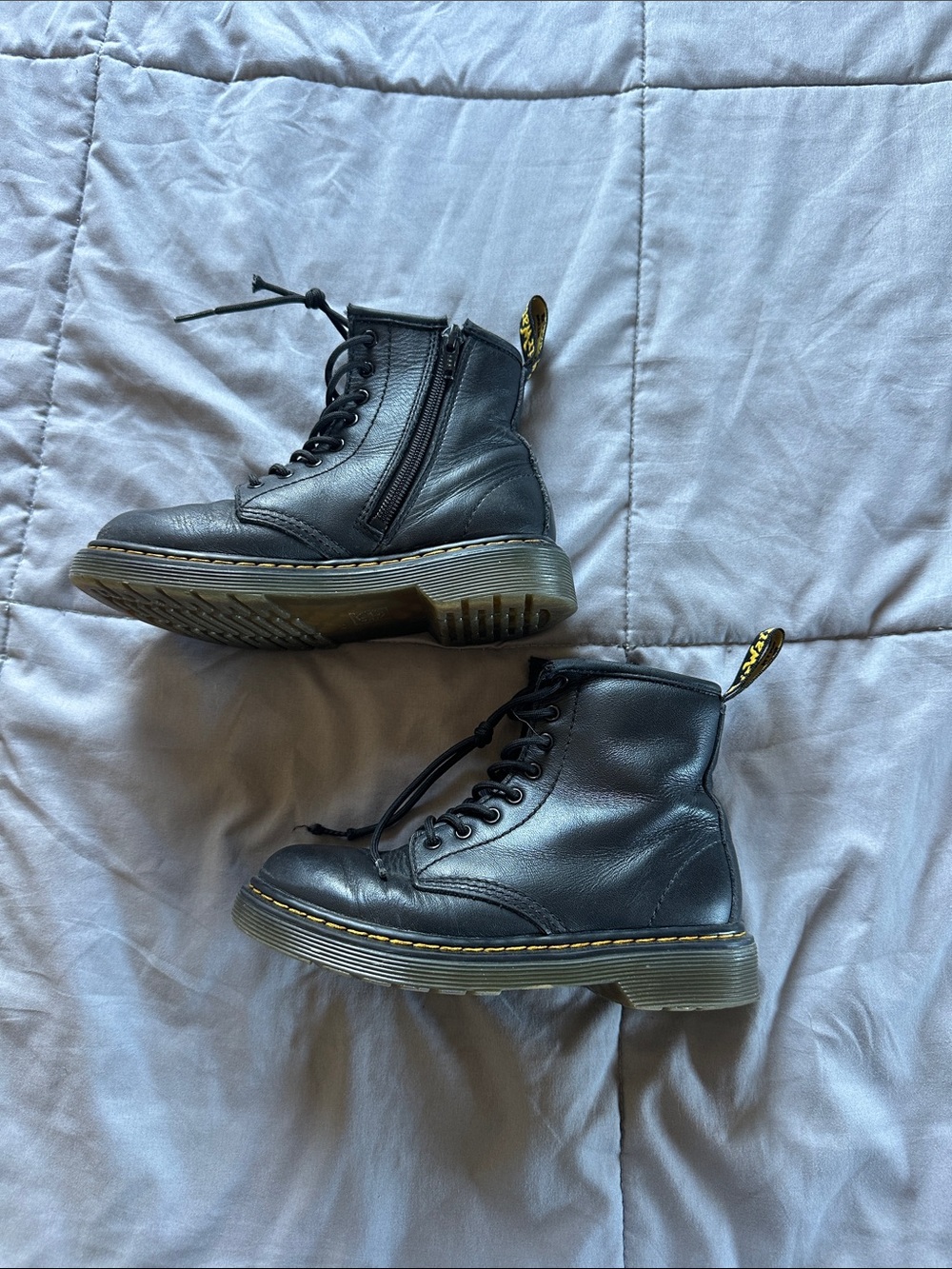 Kids Dr. Martens Black Leather Lace-Up Ankle Boots with Yellow Stitching